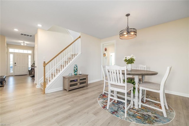 dining room with light hardwood / wood-style floors