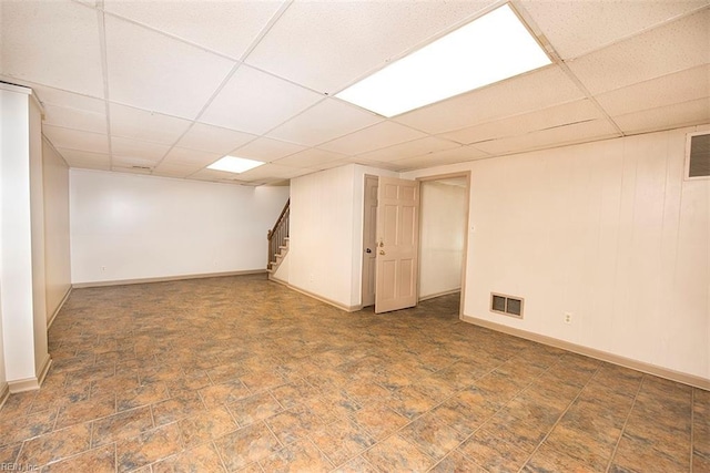 basement with a drop ceiling