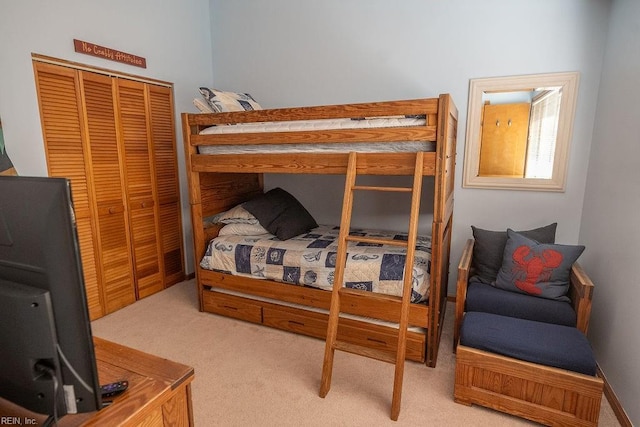 bedroom featuring carpet floors and a closet