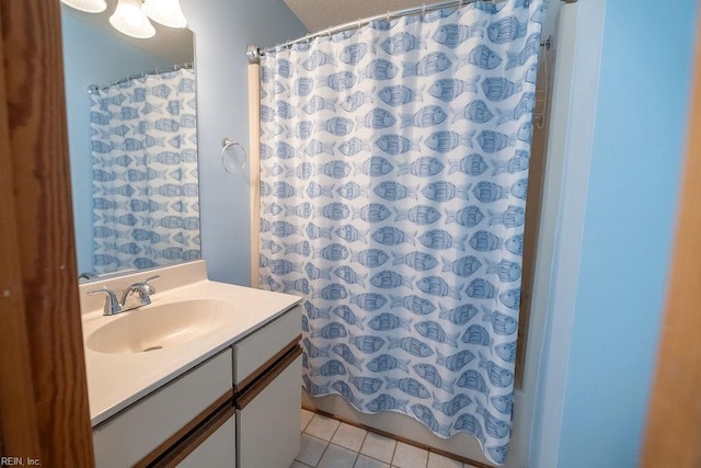 bathroom with vanity, tile patterned floors, and a shower with shower curtain