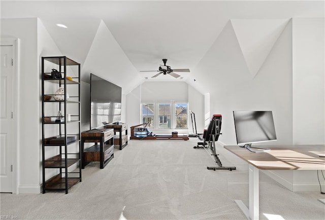 exercise room with lofted ceiling, light colored carpet, and ceiling fan