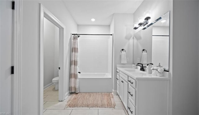 full bathroom featuring toilet, tile patterned floors, shower / bathtub combination with curtain, and vanity