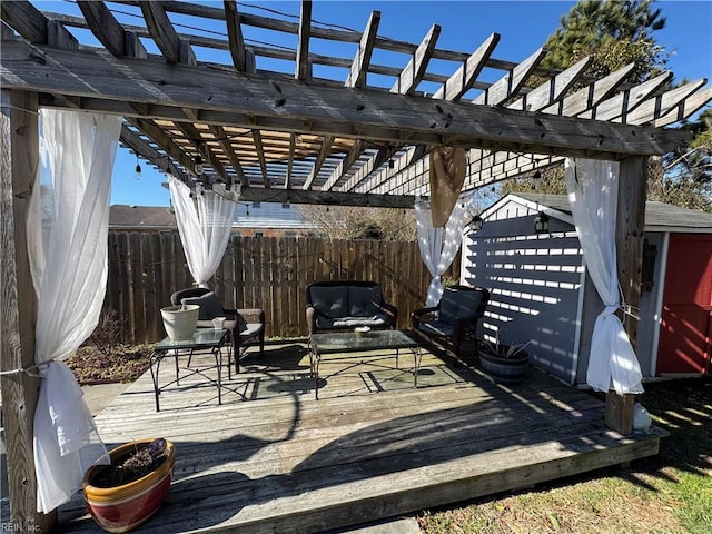 view of patio featuring a deck and a pergola