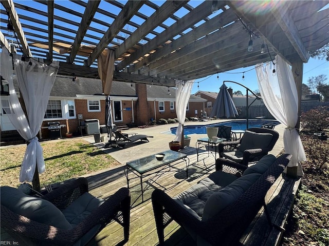 view of patio / terrace with outdoor lounge area and a pergola