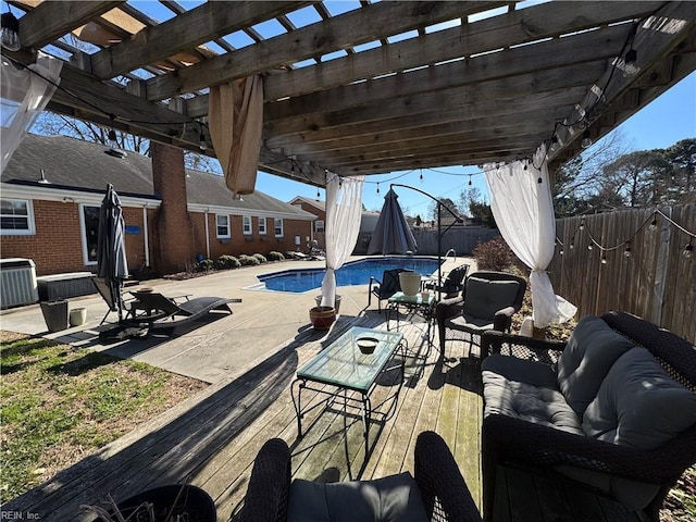 view of patio / terrace with an outdoor hangout area, a swimming pool side deck, central AC, and a pergola