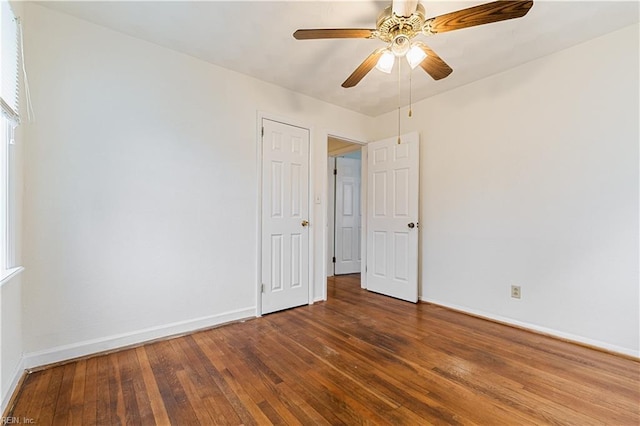 unfurnished room with wood-type flooring and ceiling fan