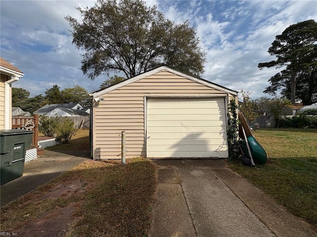 garage with a yard