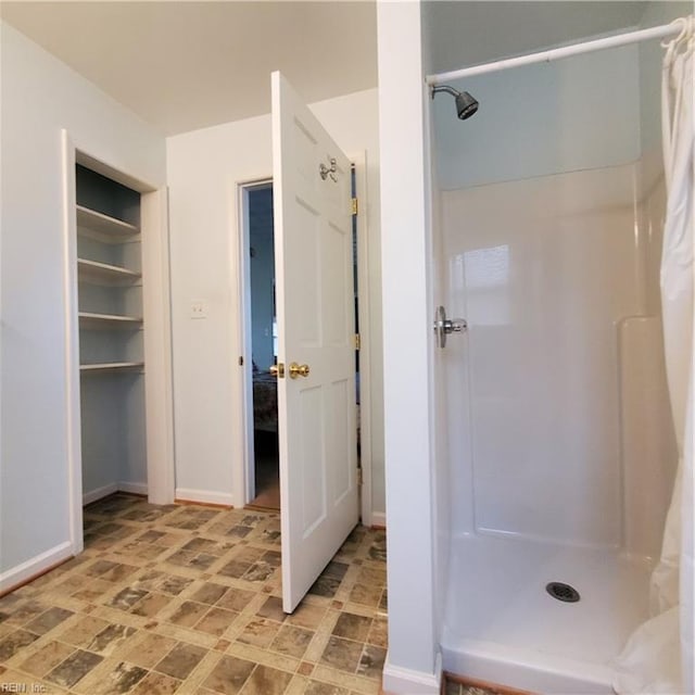 bathroom with a shower with curtain