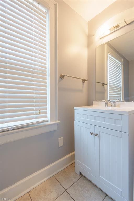 bathroom with vanity and tile patterned floors