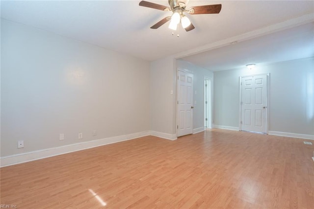 unfurnished room with ceiling fan and light hardwood / wood-style flooring