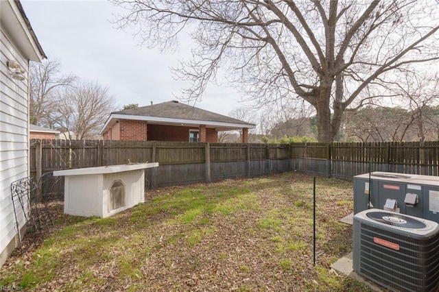 view of yard featuring central AC