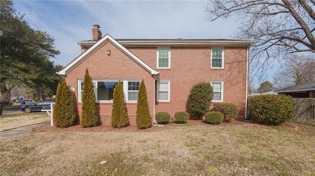 view of property exterior featuring a yard