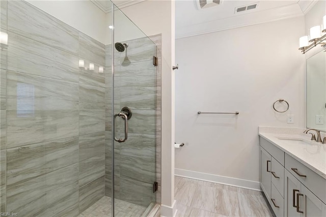 bathroom featuring crown molding, vanity, and an enclosed shower