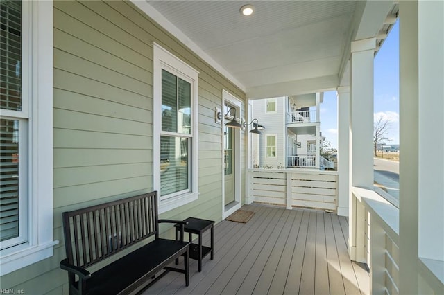 wooden terrace featuring a porch