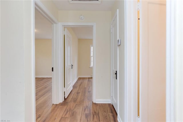 hall featuring light wood-type flooring