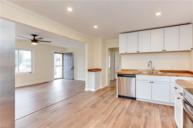 kitchen featuring white cabinetry, stainless steel dishwasher, light hardwood / wood-style floors, and butcher block counters