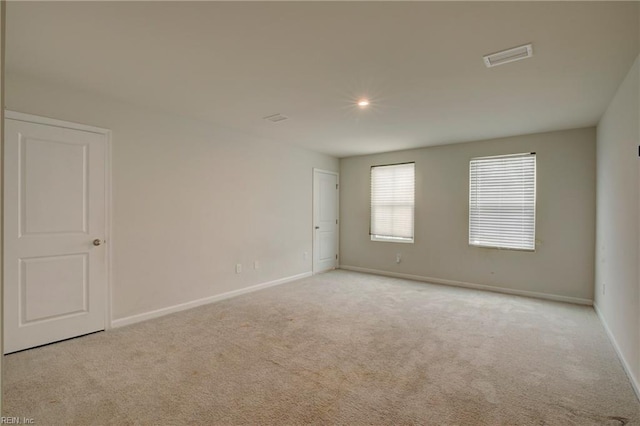 view of carpeted spare room