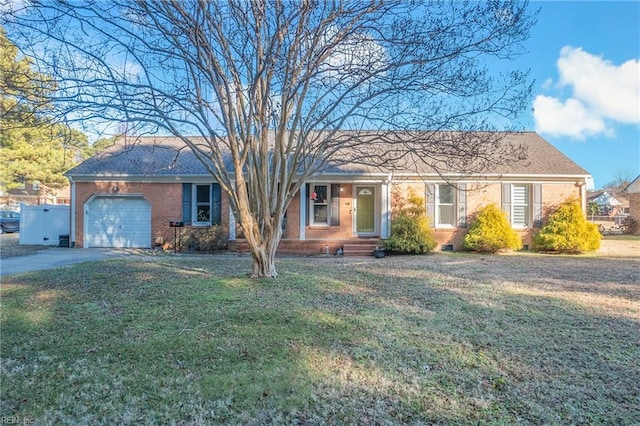 single story home featuring a garage and a front yard