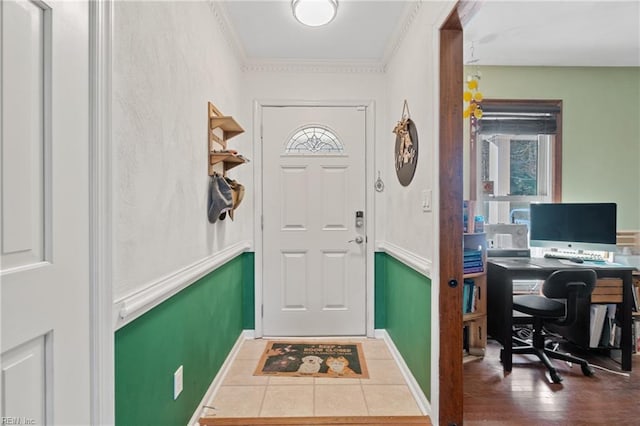 interior space featuring hardwood / wood-style flooring and ornamental molding