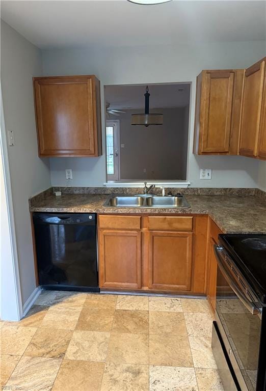 kitchen featuring dishwasher, sink, and electric range