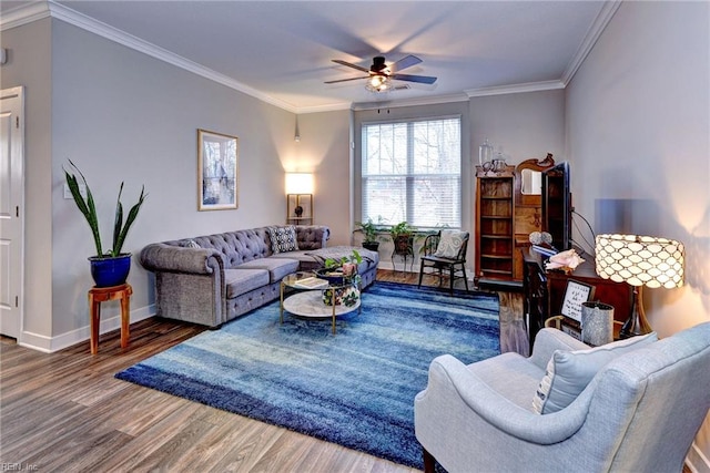 living room featuring crown molding, ceiling fan, and hardwood / wood-style floors