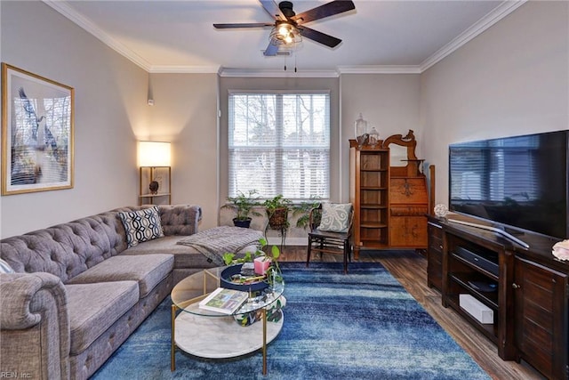 living room featuring crown molding, ceiling fan, and dark hardwood / wood-style floors