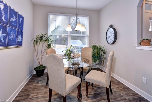 dining space with dark wood-type flooring