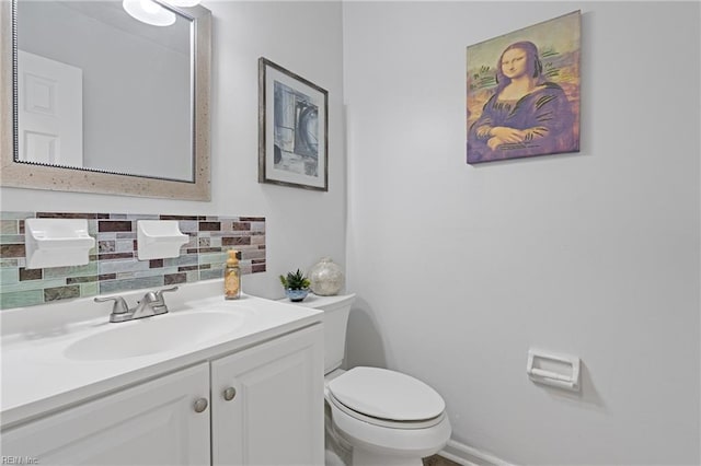 3613 Wetherington Dr Unit 103, Virginia Beach, VA 23453 - bathroom with toilet, vanity, and decorative backsplash