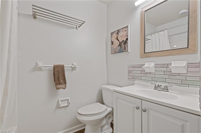 3613 Wetherington Dr Unit 103, Virginia Beach, VA 23453 - bathroom with vanity, backsplash, and toilet
