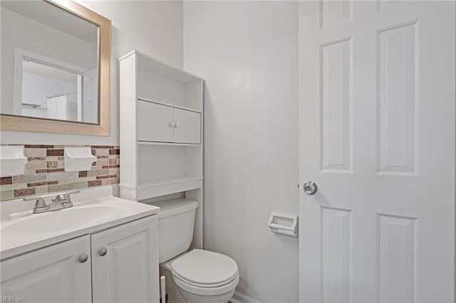 3613 Wetherington Dr Unit 103, Virginia Beach, VA 23453 - bathroom featuring vanity, backsplash, and toilet