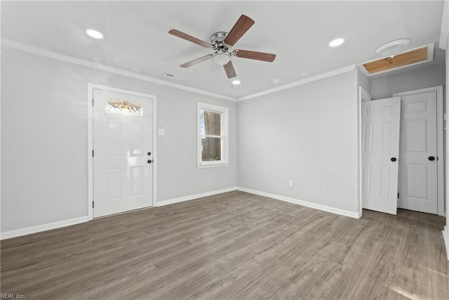 unfurnished room with wood-type flooring, ornamental molding, and ceiling fan