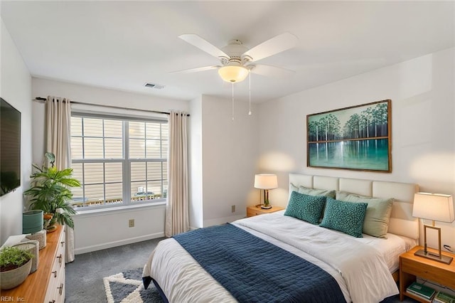 carpeted bedroom with ceiling fan