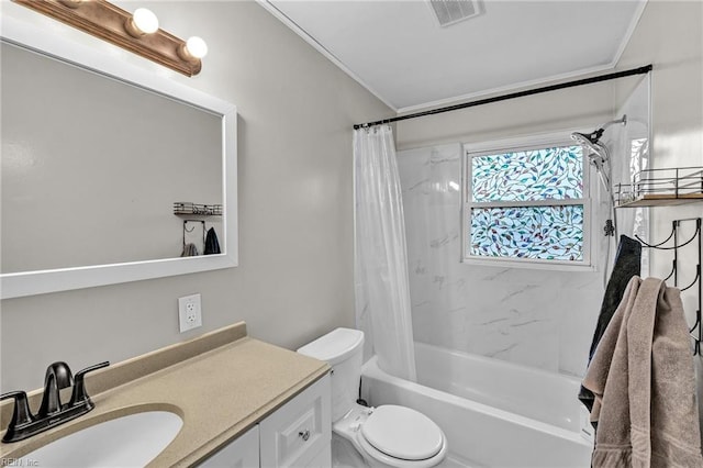 full bathroom featuring vanity, shower / bath combination with curtain, crown molding, and toilet