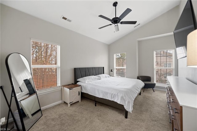 carpeted bedroom featuring ceiling fan and lofted ceiling