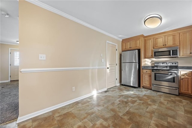 kitchen featuring ornamental molding and appliances with stainless steel finishes