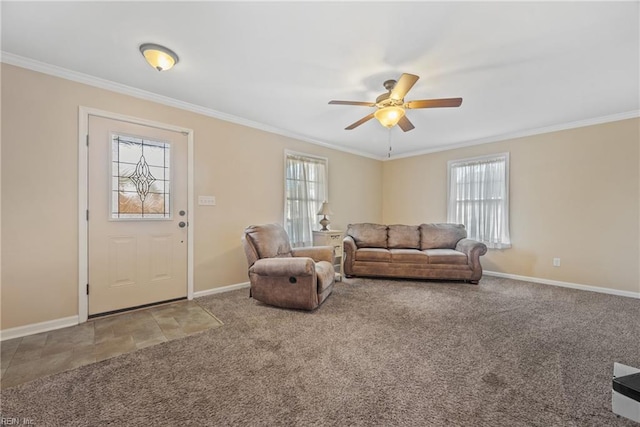 living room featuring crown molding, carpet flooring, and a wealth of natural light