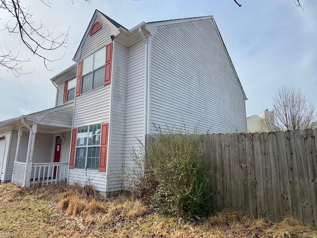 view of home's exterior with covered porch