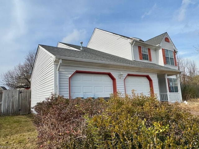 view of property exterior with a garage