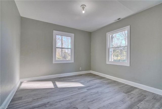 empty room featuring light hardwood / wood-style floors