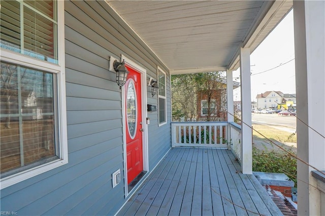 wooden terrace with covered porch