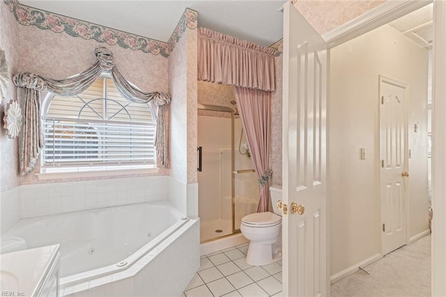 full bathroom featuring tile patterned flooring, shower with separate bathtub, vanity, and toilet