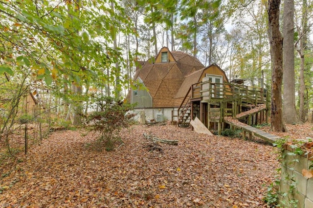 rear view of property with a deck