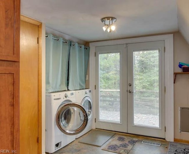 washroom featuring washer / clothes dryer and french doors