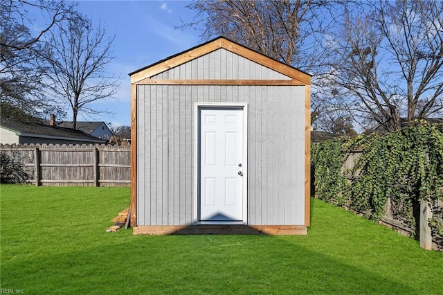 view of outdoor structure featuring a yard