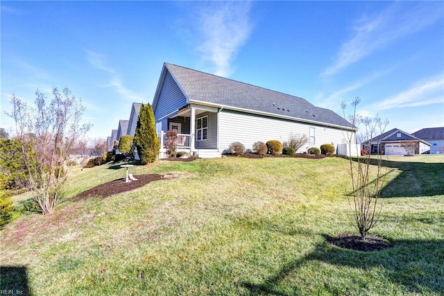 exterior space with a porch and a yard