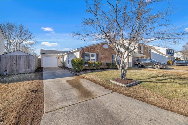 view of front of house featuring a garage and a front lawn