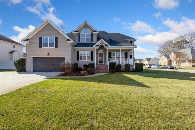 view of front facade featuring a garage, a front lawn, and a porch