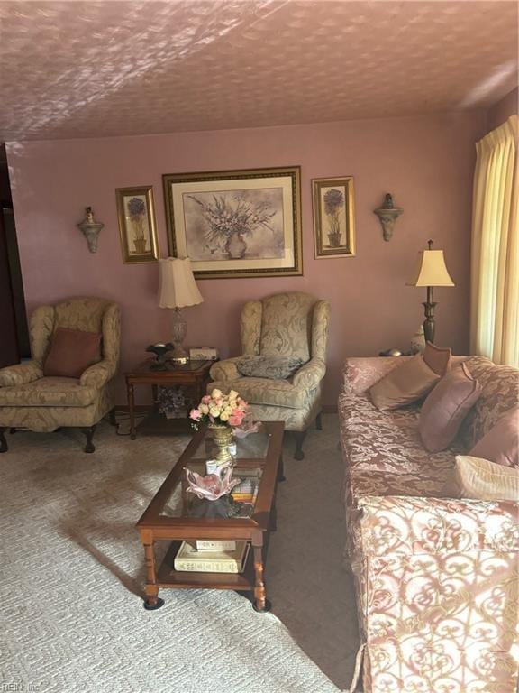 carpeted living room featuring a textured ceiling