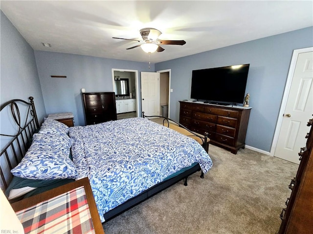 bedroom featuring light carpet and ceiling fan