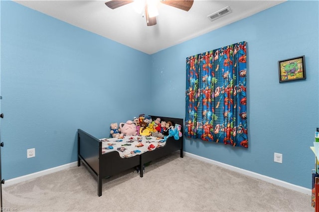 carpeted bedroom featuring ceiling fan